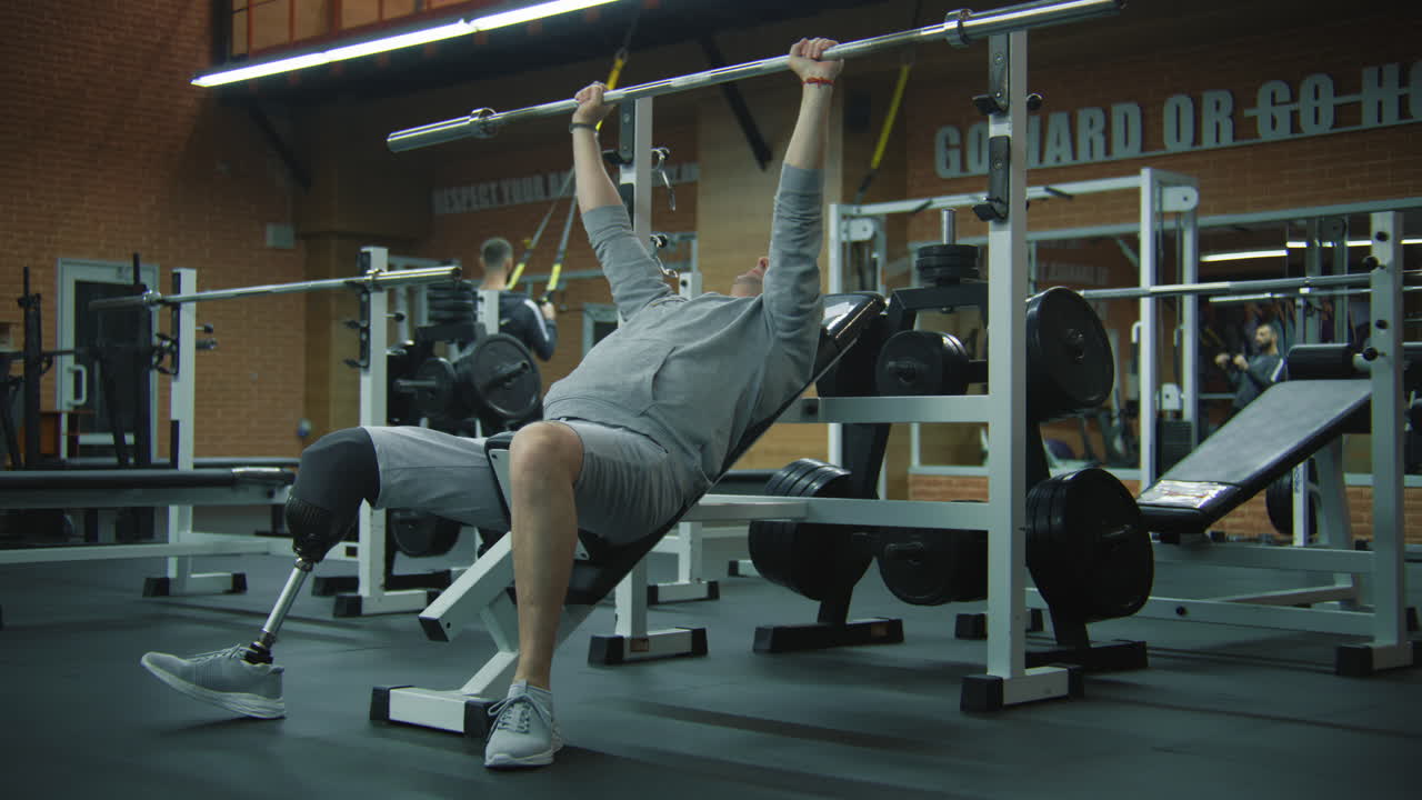 Man with Prosthetic Leg Bench Pressing