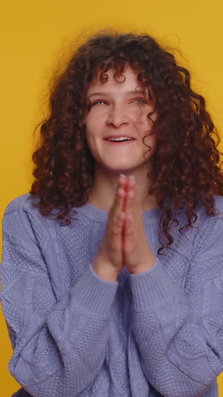 Sneaky cunning young woman with tricky face scheming evil plan cheats jokes revenge and pranks