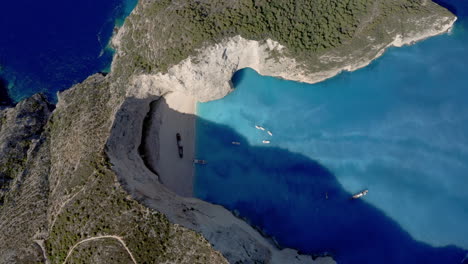 Aerial:-Top-down-shot-of-Navagio-beach-in-Zakynthos,-Greece