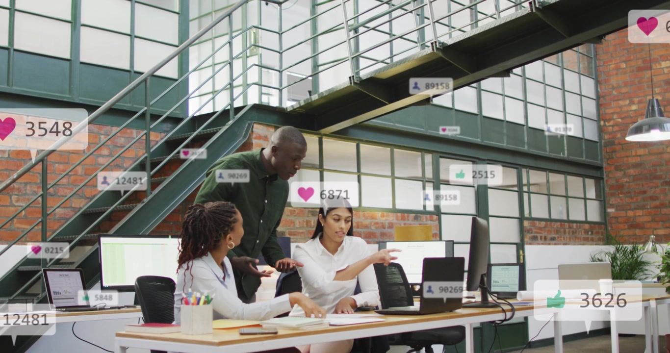 Diverse Business Team Collaborating in Modern Office with Social Media Overlays