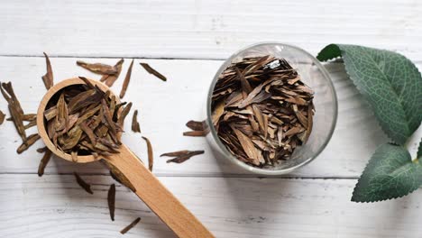 Dry-tea-leaves-in-a-jar-on-table