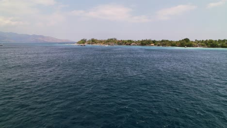 Aerial-Approaching-Towards-the-Coastline-of-Gili-Island-Trawangan-in-Lombok-Indonesia