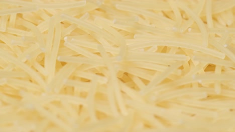 Instant Noodles Rotate in a Circle Raw Macaroni top View Closeup of a Bunch of Raw Pasta Instant Noodles Rotate in a Circle Raw Macaroni top View Closeup of a Bunch of Raw Pasta