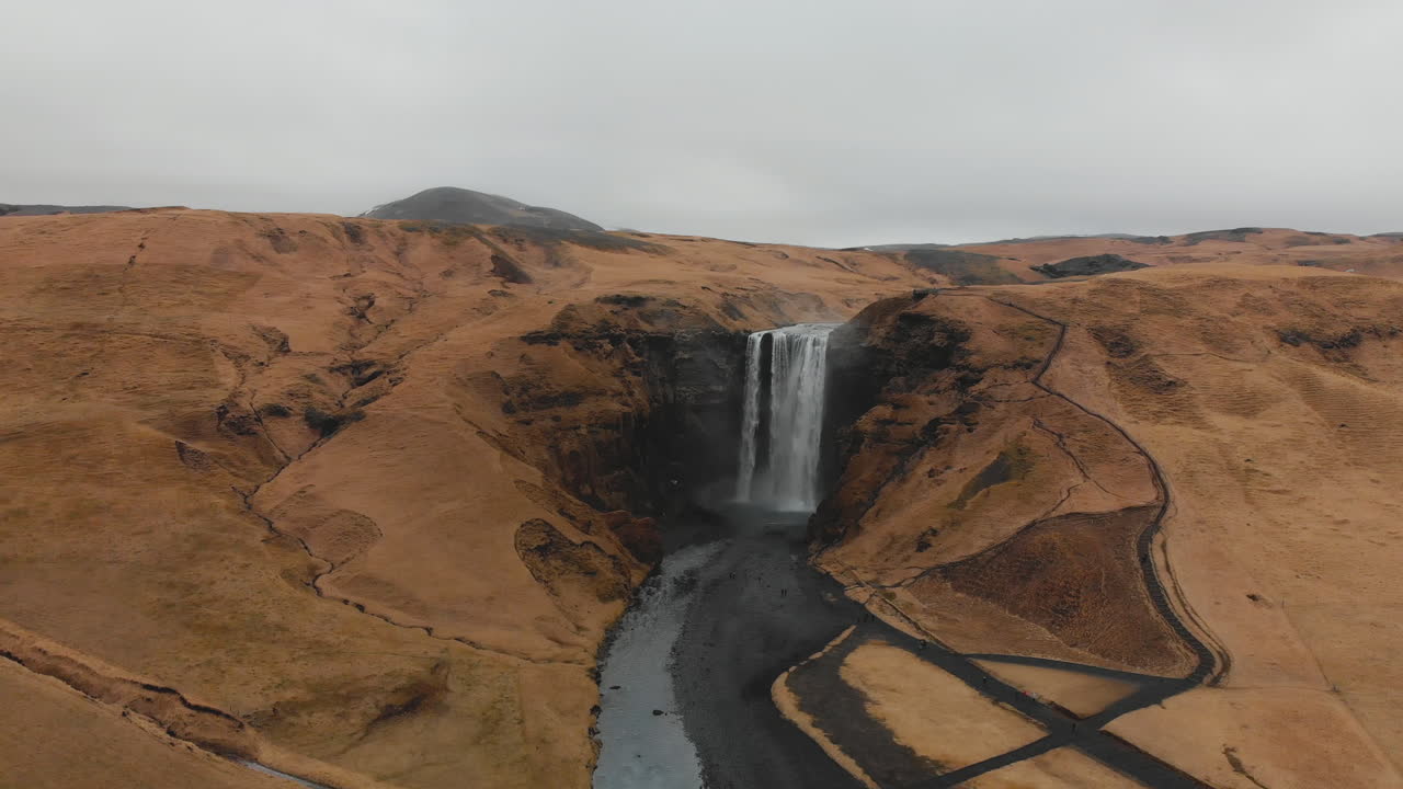 Iceland Waterfall in Dramatic Mountain Landscape