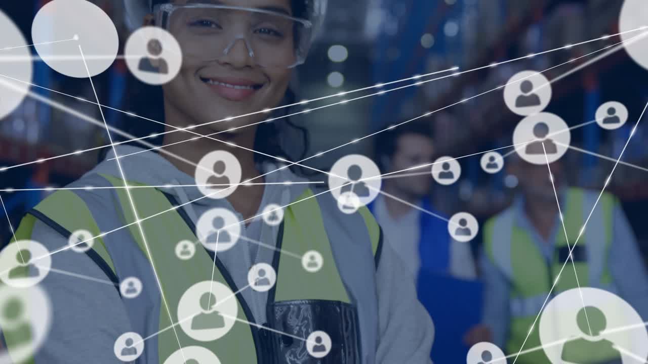 Animation of network of connections with icons over smiling diverse workers in warehouse