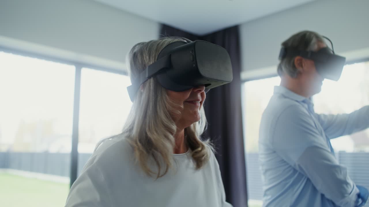 Senior Couple Experiencing Virtual Reality at Home