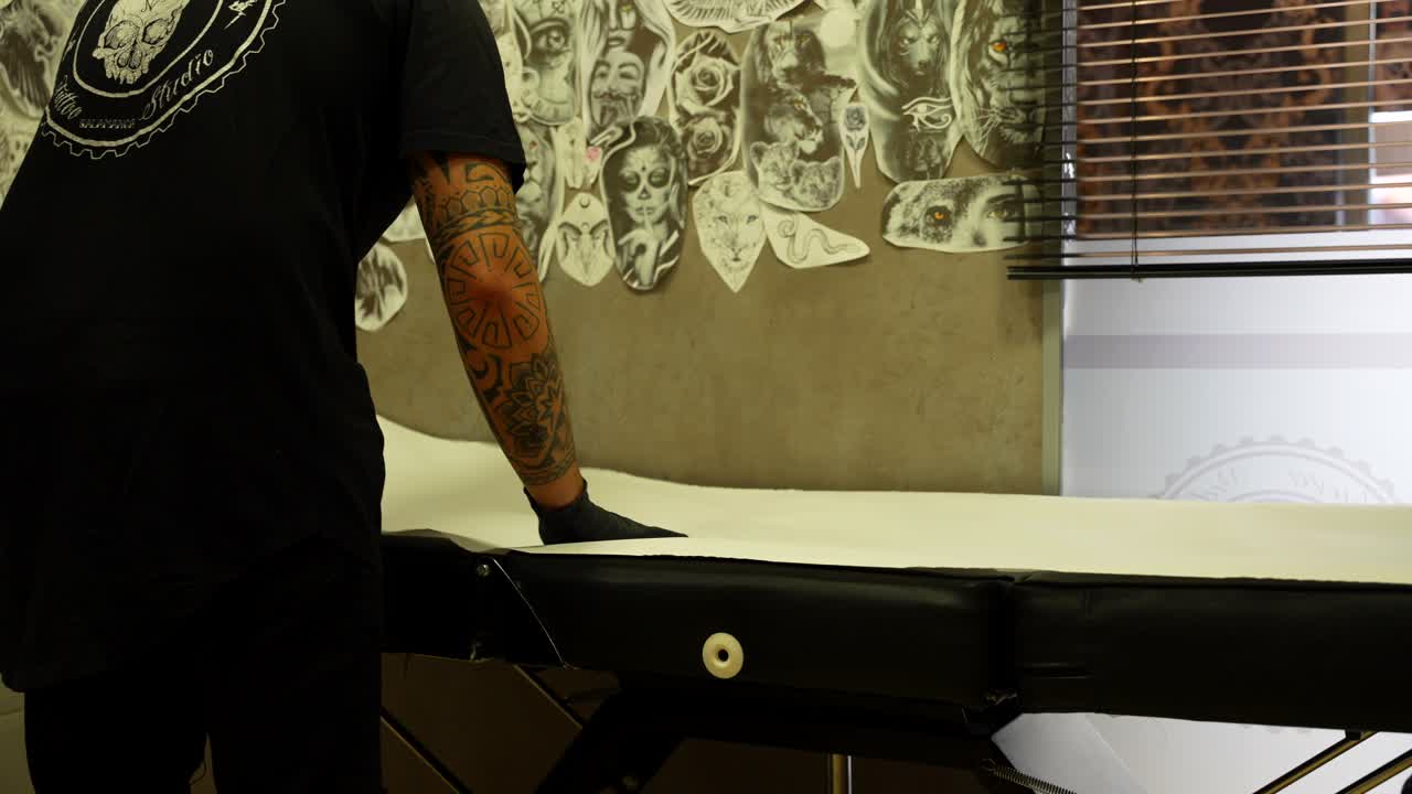 Tattoo Artist Preparing for Tattoo Session