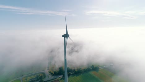 wind turbines in a misty field aerial