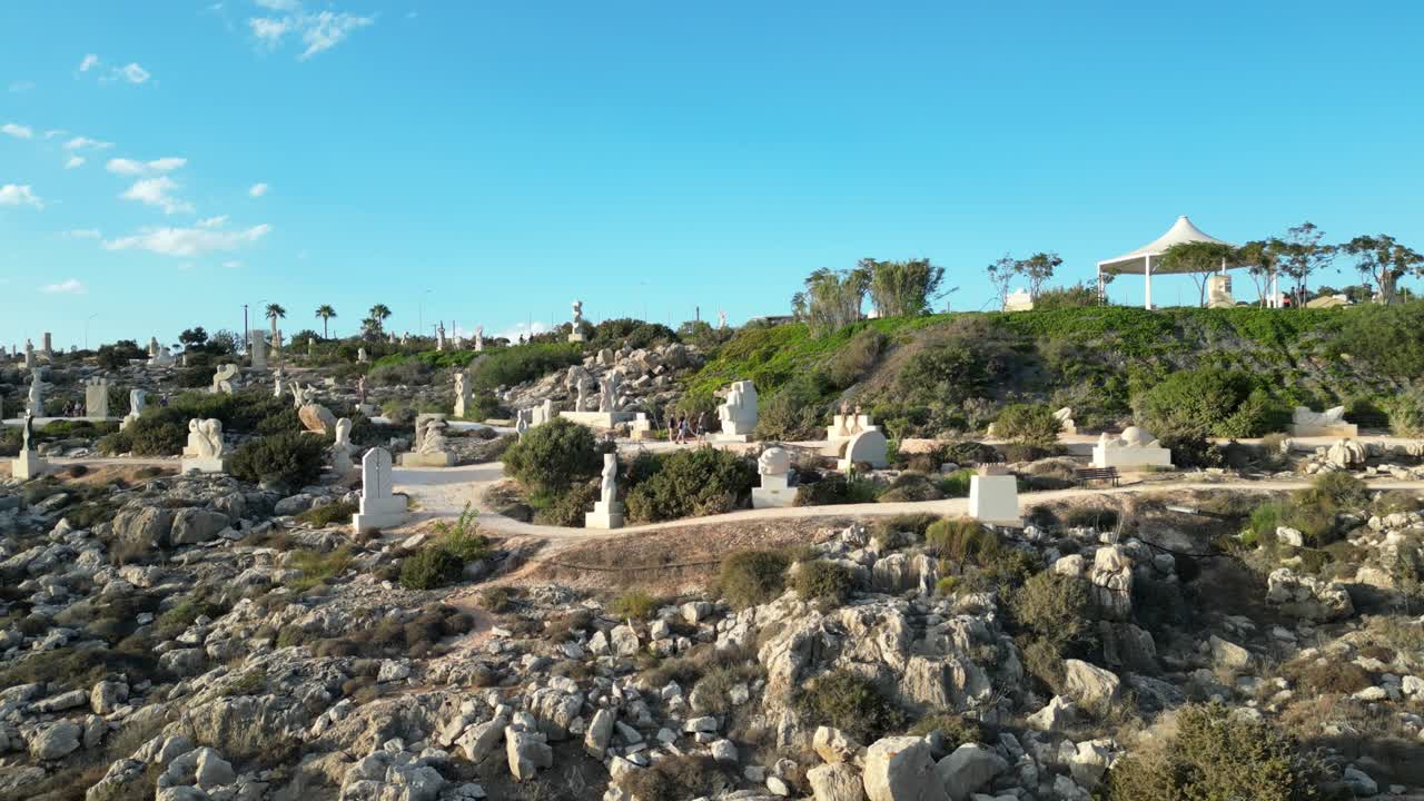 Ayia Napa Sculpture Park with artistic stone sculptures across rocky terrain. Cypru