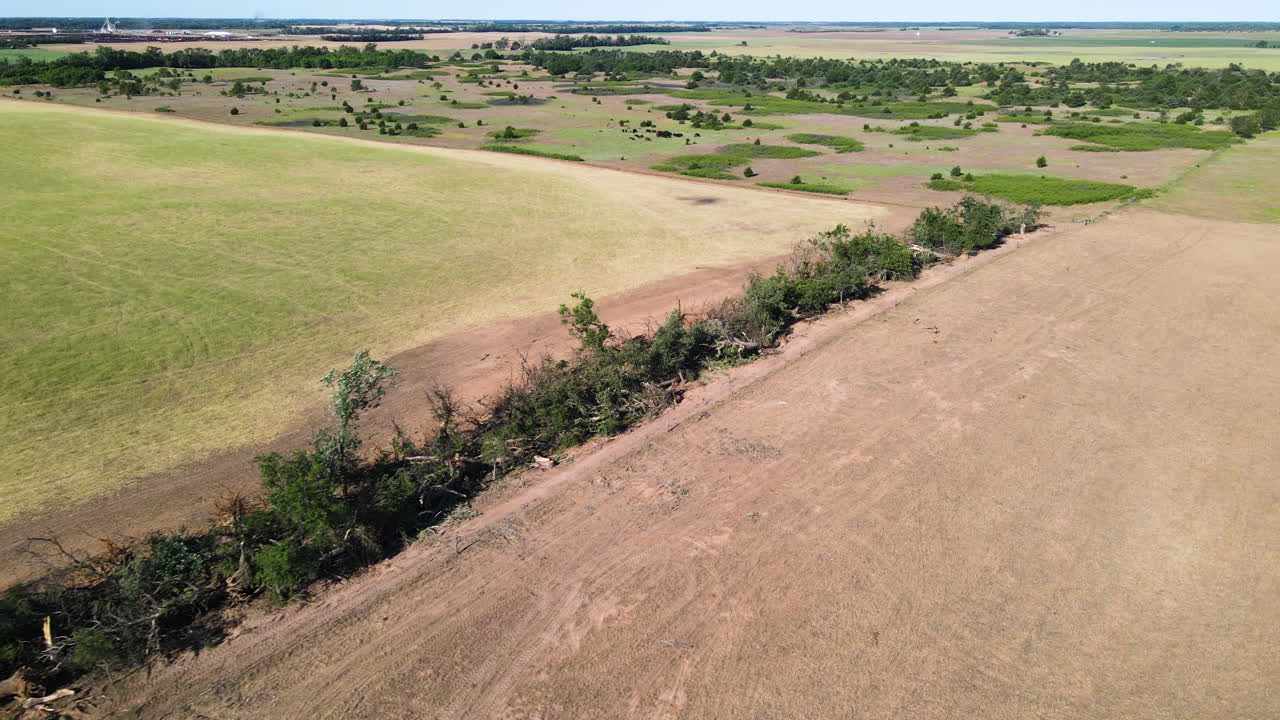 Aerial view of a line of damaged trees, Tornado aftermath in Kansas, USA