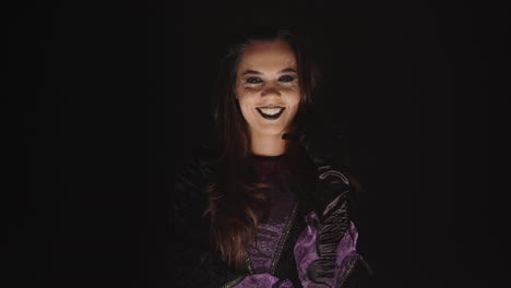 scary woman dressed up like a witch