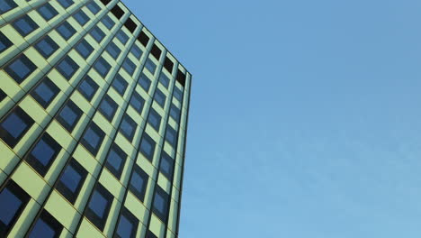 upward view of a high-rise building with geometric design