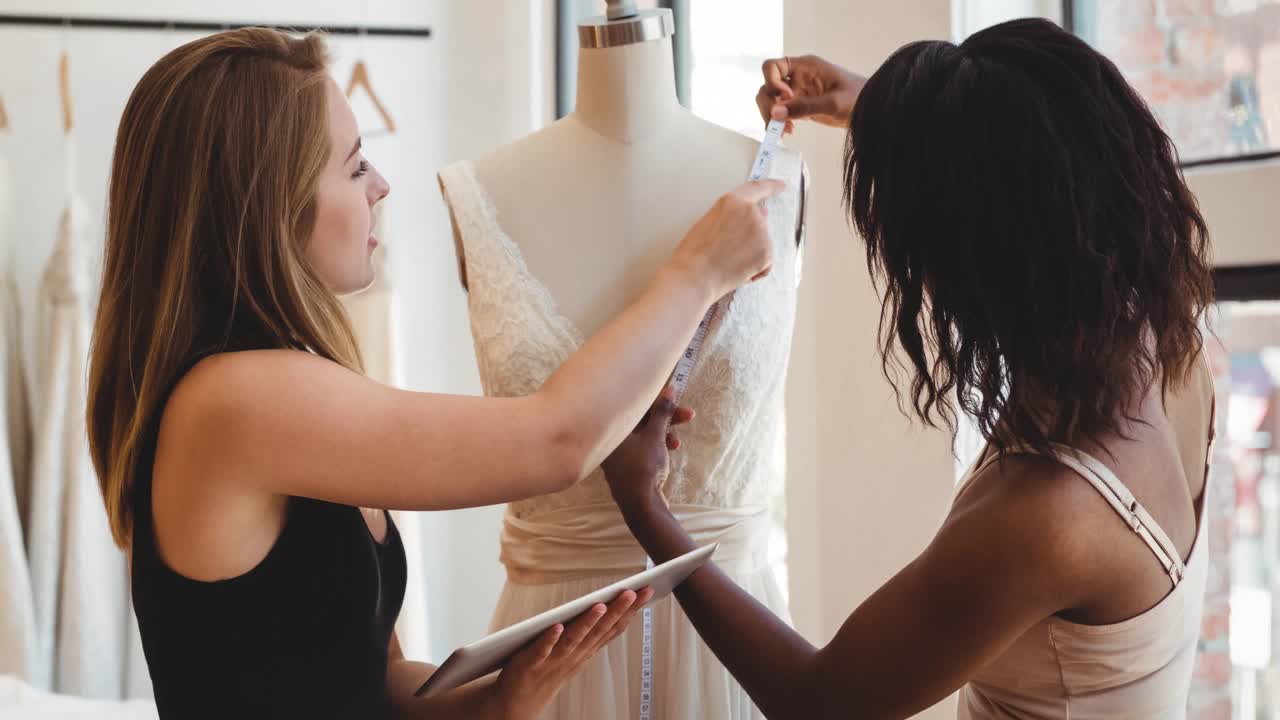 Animation of two female fashion designers working in fashion studio