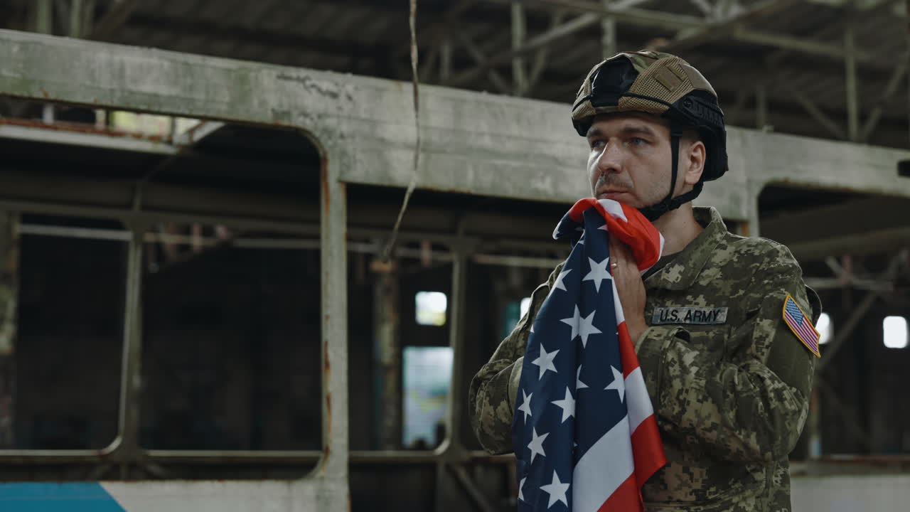 Soldier Mourns with American Flag