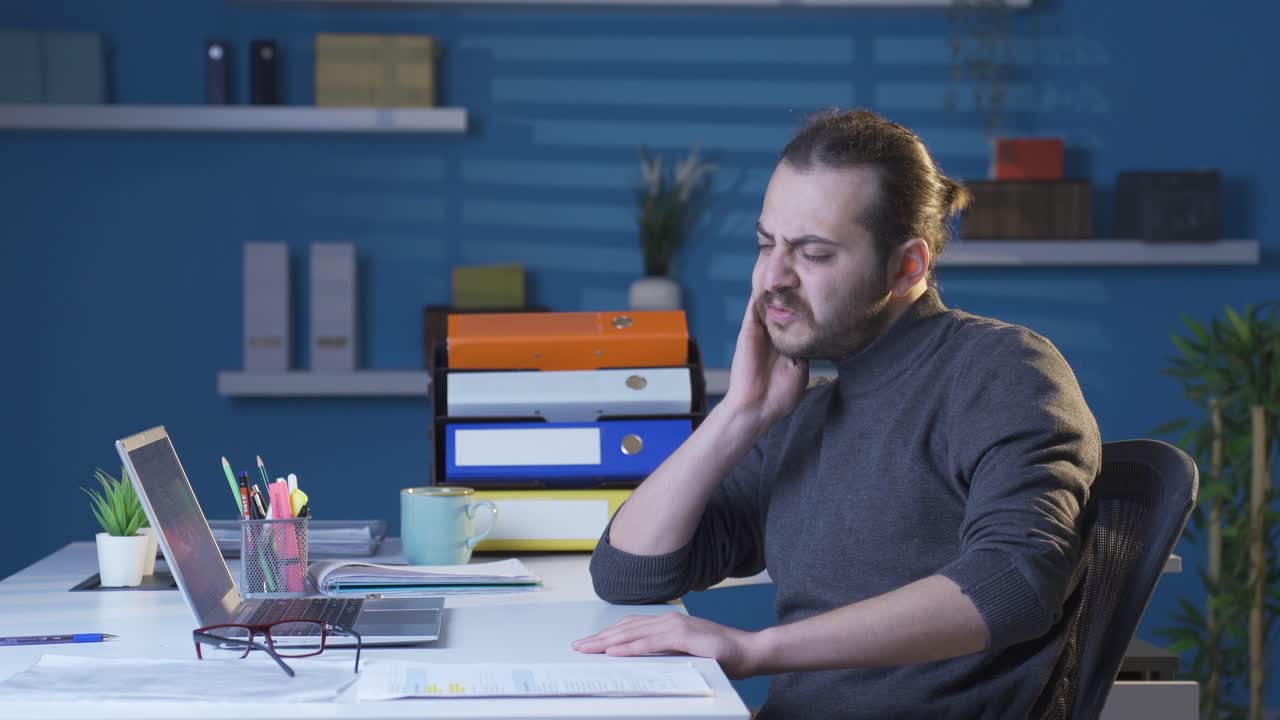 Man with ailments such as gingivitis, tooth sensitivity, tooth decay.