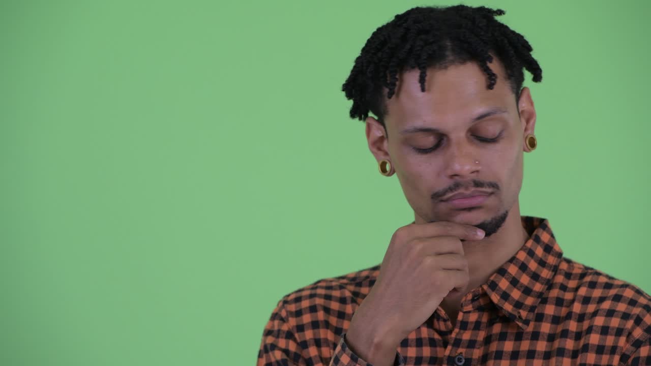 Young handsome African man with dreadlocks