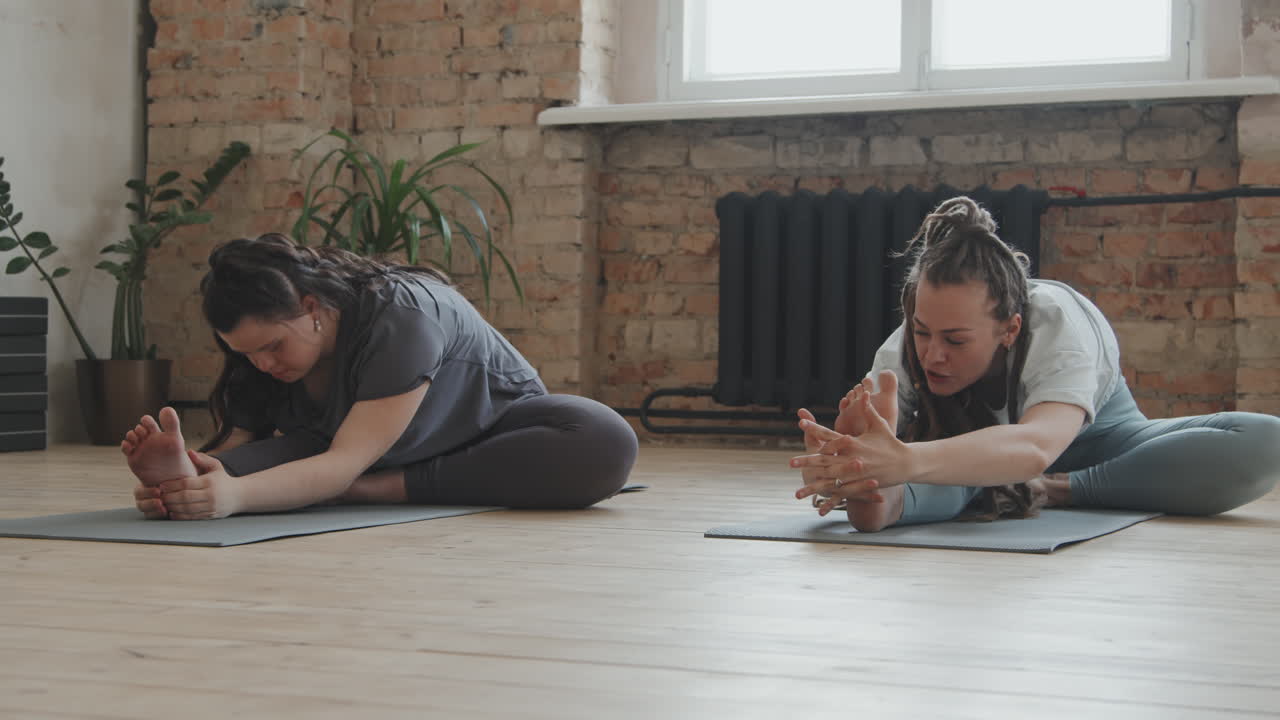Individual Yoga Class With Young Woman With Down Syndrome