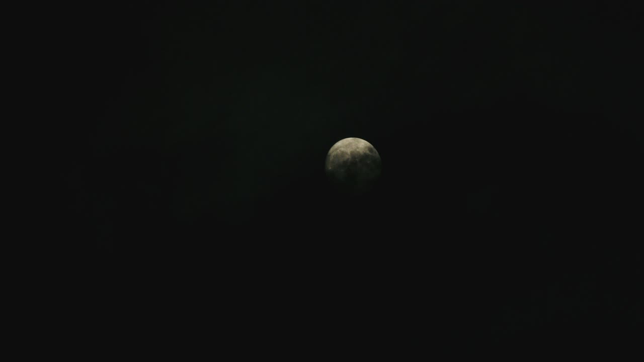 Moon on Cloudy Day