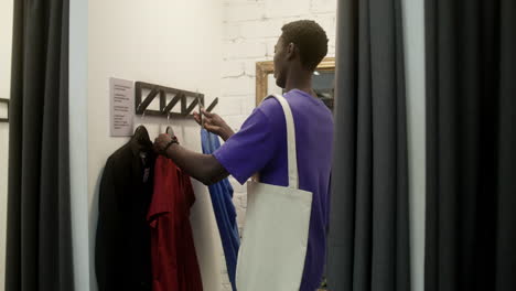 back view of african american man in a store