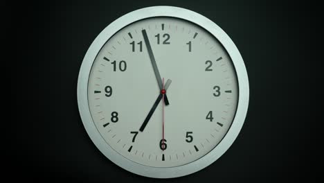 white wall clock 3 minutes to 7 o'clock.