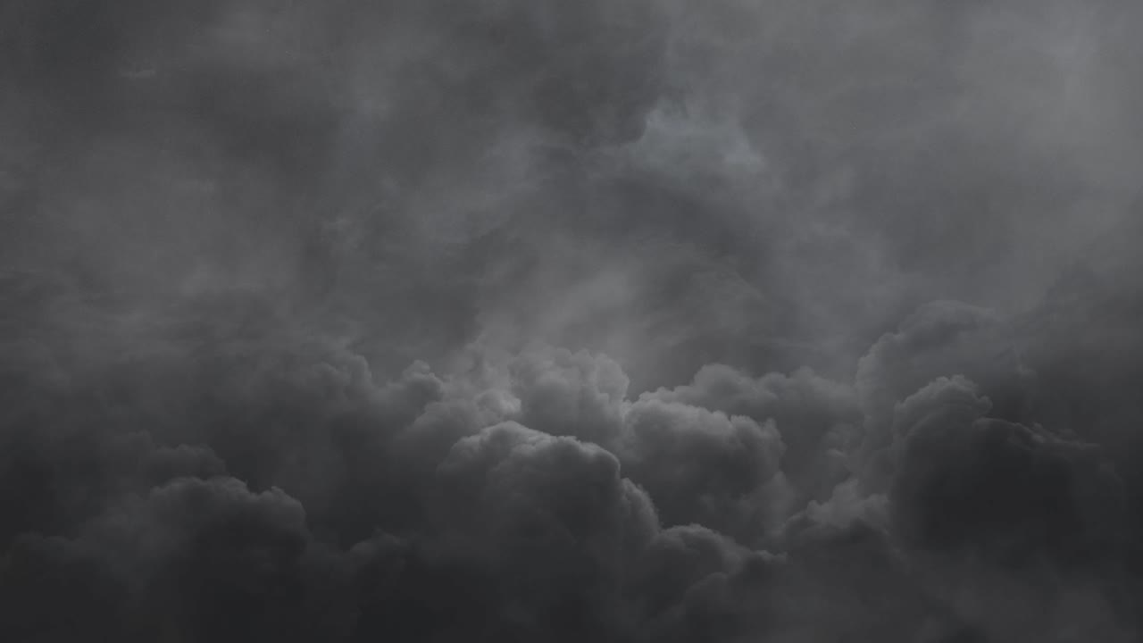weather changes inside dark clouds accompanied by lightning