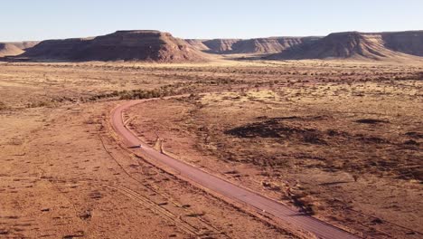 Adventure-Across-Endless-Dunes:-4K-drone-shot-of-Desert-Drive-in-Namibia,-Africa-with-Rooftop-Tented-4x4-Toyota-Hilux