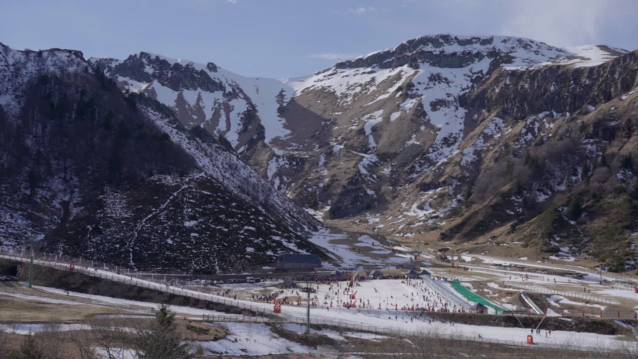 Ski resort from afar, view of the mountains surrounding