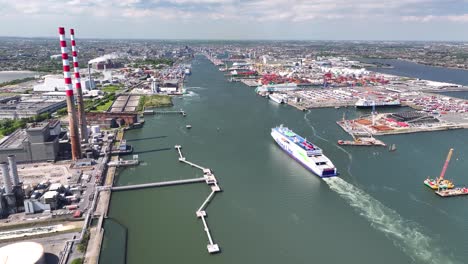 ship is sailing to dublin, ireland. aerial of industrial infrastructure, transportation scene.