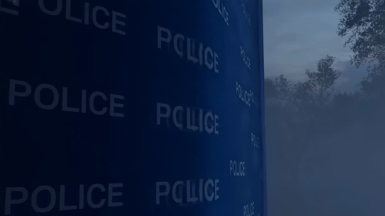 Repeating 'POLICE' text on a dark blue surface at night