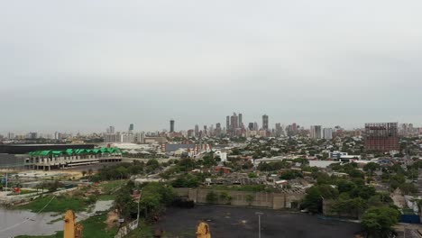 aerial view of a city with skyscrapers and residential areas