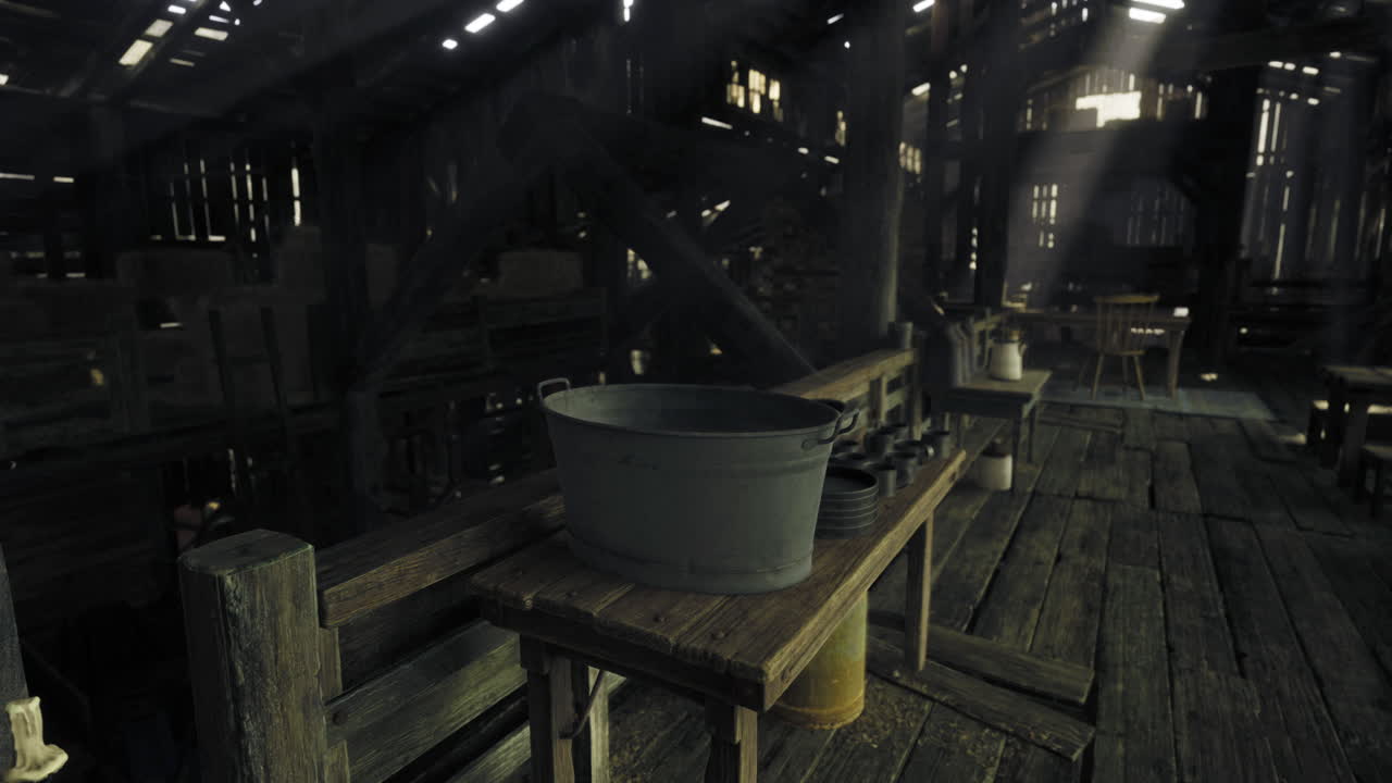 Old wooden barn interior featuring a metal container and rustic utensils