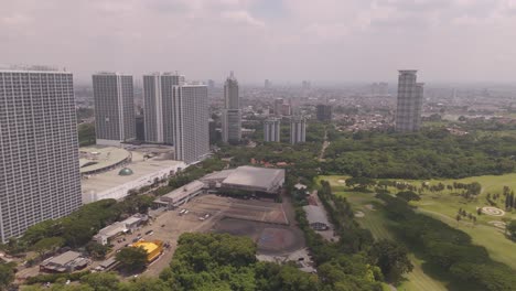 aerial establishing shot of residential, office buildings, development and cityscape in tangerang karawaci, jakarta.4k