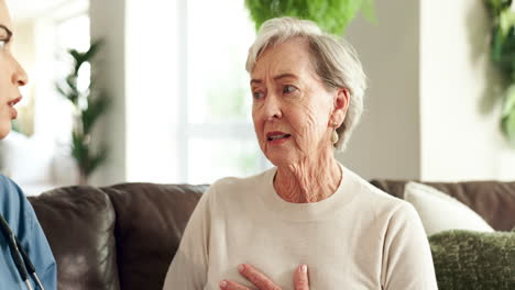 nurse visits senior woman at home