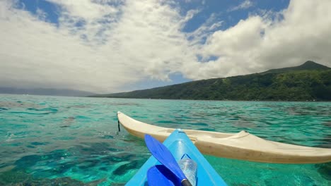 kayaking at teahupo'o in tahiti french polynesia - the end of the world in the coral lagoon on tahiti iti