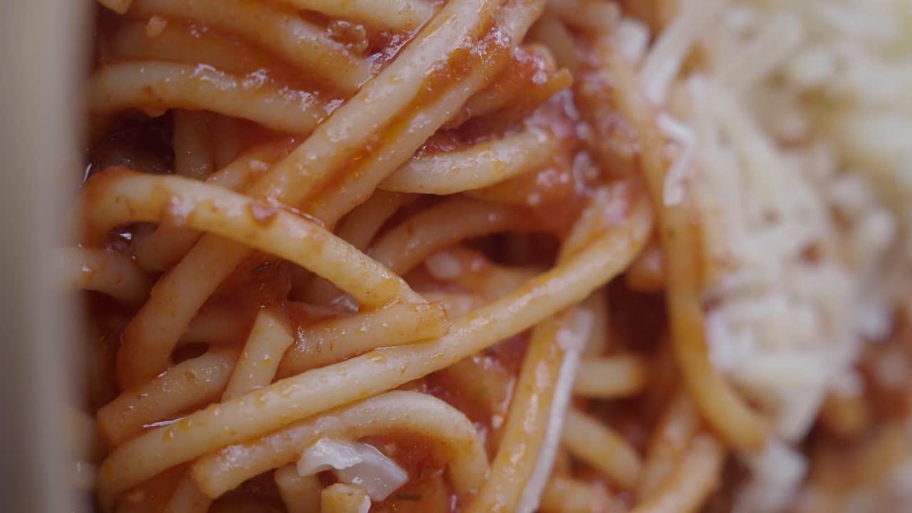 Close-up of Spaghetti with Tomato Sauce and Cheese