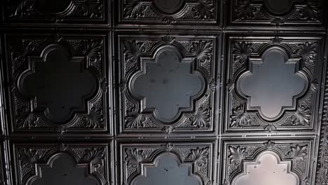 detailed black ceiling in a trendy bar