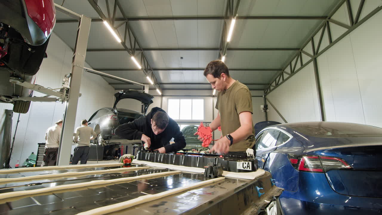 Tesla Battery Replacement in a Repair Shop