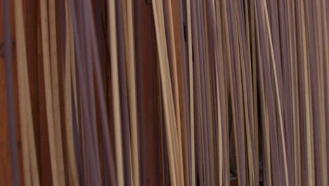 close-up of vertical wooden sticks or bamboo texture