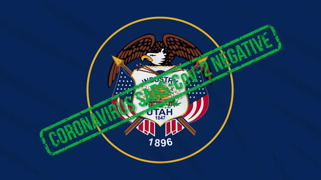 미국 유타 주 (utah) 의 발은 코로나 바이러스로부터의 자유의 녹색 스프로 흔들리고 있습니다.