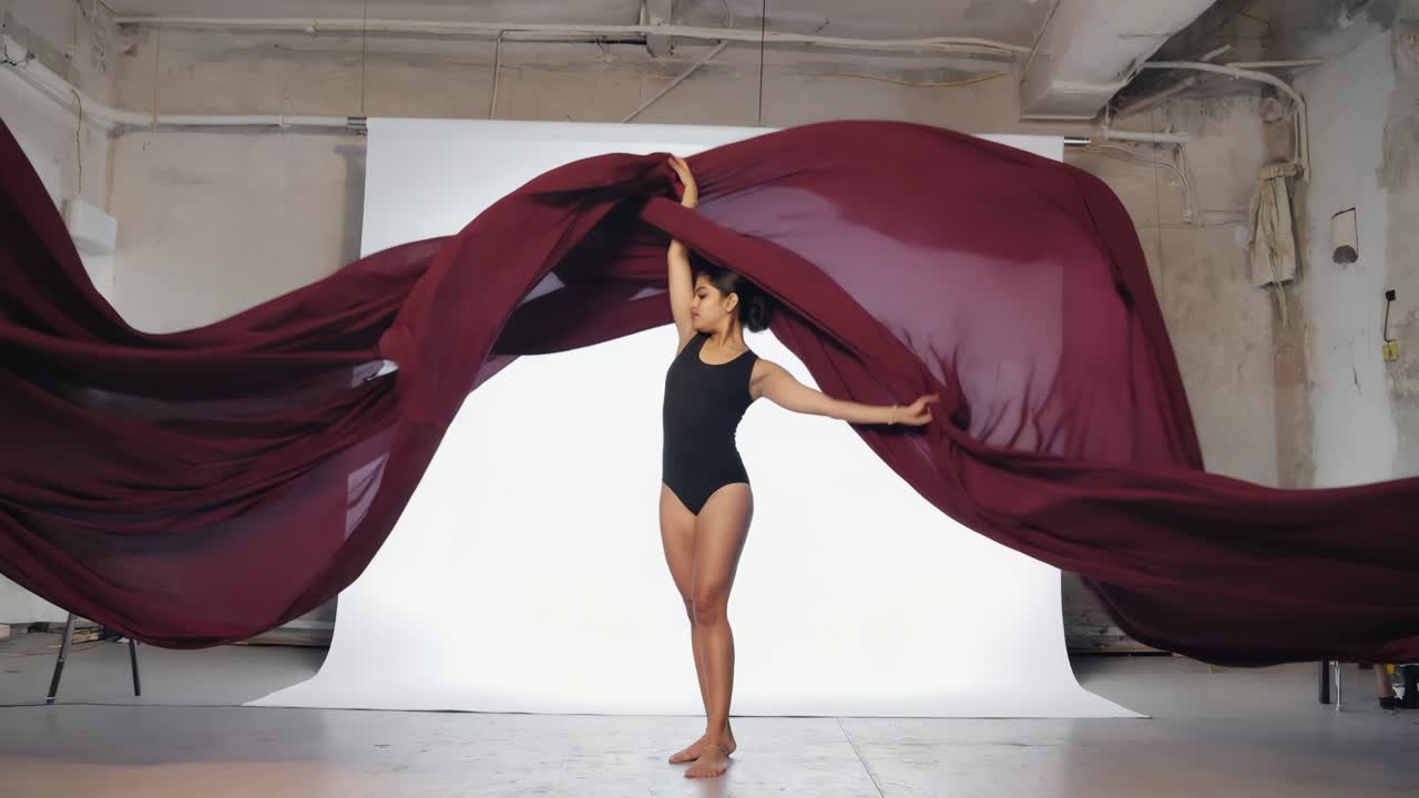 Woman Dancing with Red Fabric