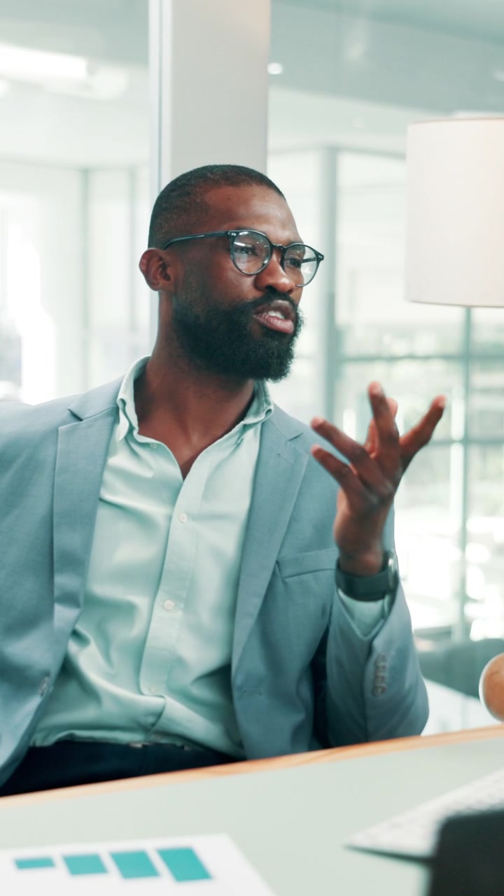 Professional Businessman Discussing Strategy in Modern Office