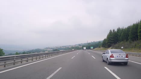 highway viaduct and vehicles on the road.