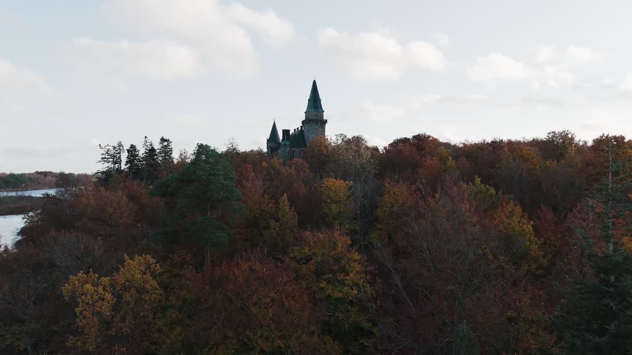 Tracking shot towards Teleborg Castle in Växjo, Sweden, Fall, Orange and Yellow Leafs