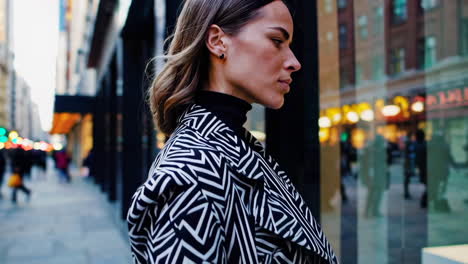 woman window shopping in the city