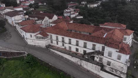 aerial view of the observatory part of the science and technology of mining museum revealing the whole building of the federal university of ouro preto, minas gerais, brazil