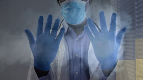 animation of yellow squares moving over african american male doctor wearing gloves and face mask