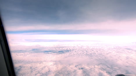 looking at the clouds and da nang city in the airplane in asia.