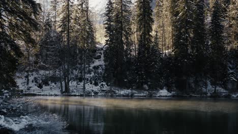 Immerse-your-audience-in-a-mist-covered-lake-illuminated-by-the-first-light-of-day