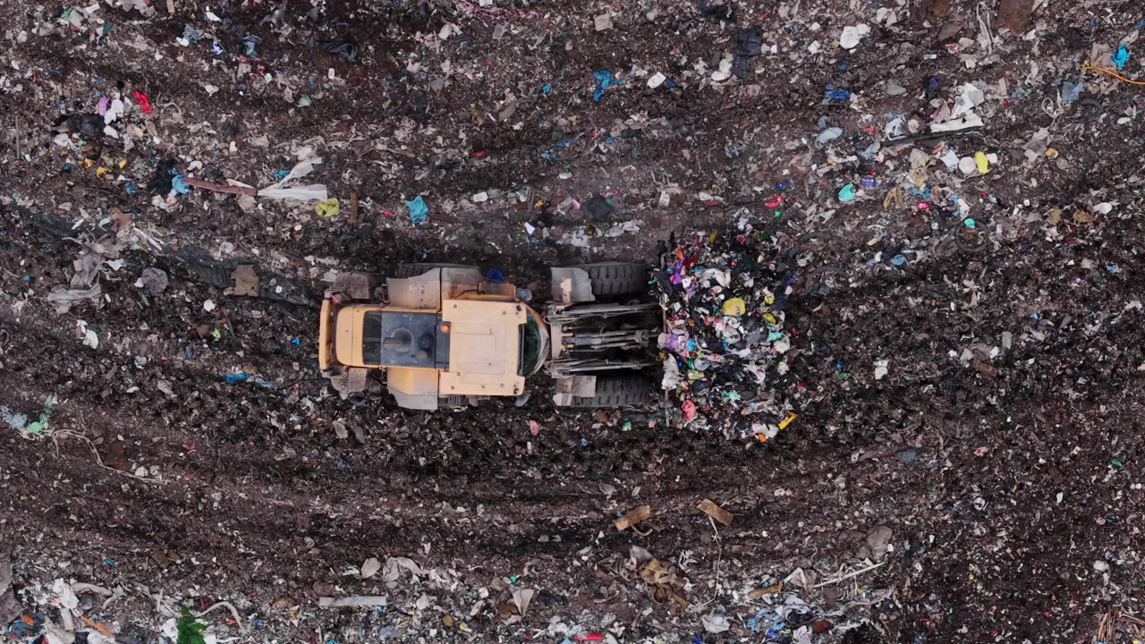 Loader carries mixed refuse across landfill in Talsi Municipality, Latvia today
