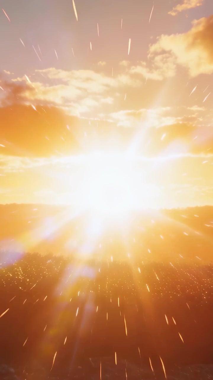 Vídeo vertical: Clarão pulsante ao nascer do sol enviando raios sobre o horizonte, nuvens brilhando e a costa cintilando